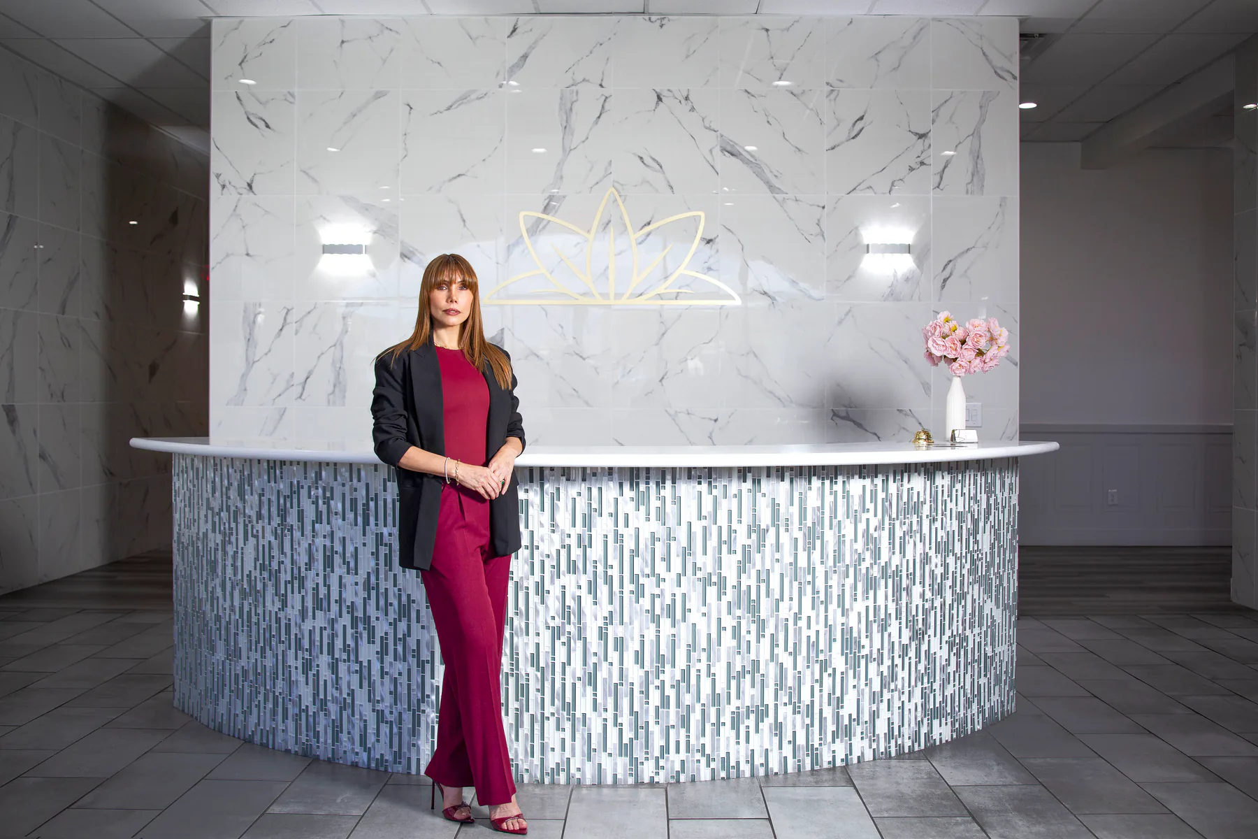 A member of the La Eternidad care team at the reception desk